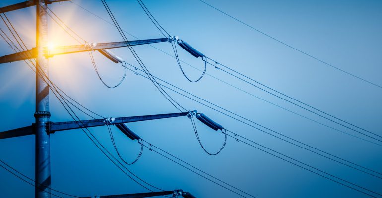 High voltage tower isolated on sky